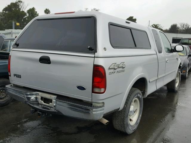 1FTZX18W4WKB26358 - 1998 FORD F150 SILVER photo 4