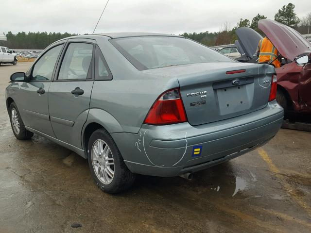 1FAFP34N05W263466 - 2005 FORD FOCUS ZX4 GRAY photo 3