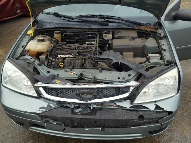 1FAFP34N05W263466 - 2005 FORD FOCUS ZX4 GRAY photo 7