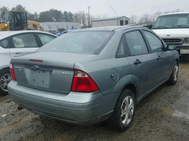 1FAFP34N45W316461 - 2005 FORD FOCUS ZX4 GREEN photo 4