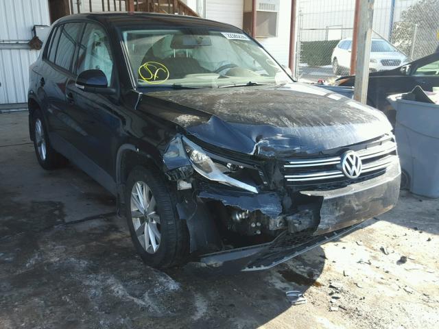 WVGBV3AX3EW623104 - 2014 VOLKSWAGEN TIGUAN S BLACK photo 1