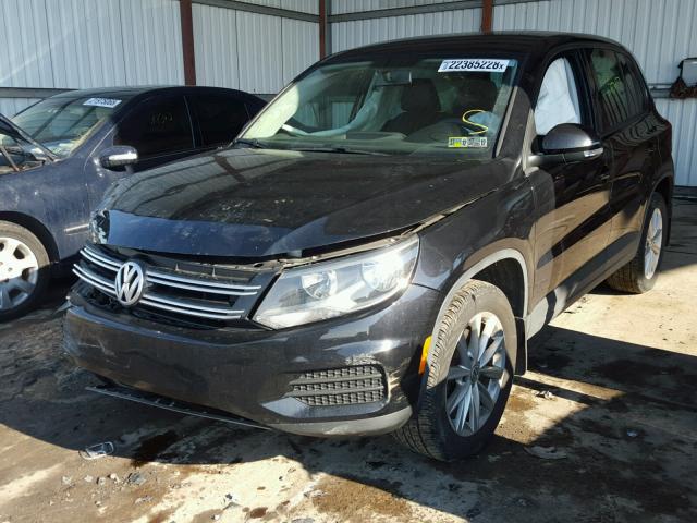 WVGBV3AX3EW623104 - 2014 VOLKSWAGEN TIGUAN S BLACK photo 2