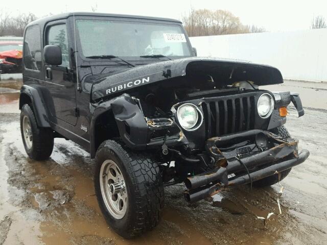 1J4FA69SX4P755663 - 2004 JEEP WRANGLER / BLACK photo 1