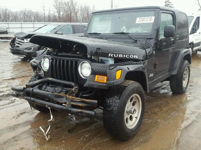 1J4FA69SX4P755663 - 2004 JEEP WRANGLER / BLACK photo 2