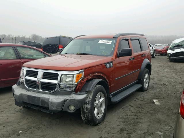 1D8GU28KX7W654761 - 2007 DODGE NITRO SXT ORANGE photo 2