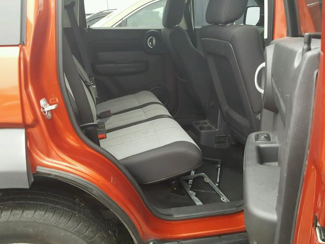 1D8GU28KX7W654761 - 2007 DODGE NITRO SXT ORANGE photo 6