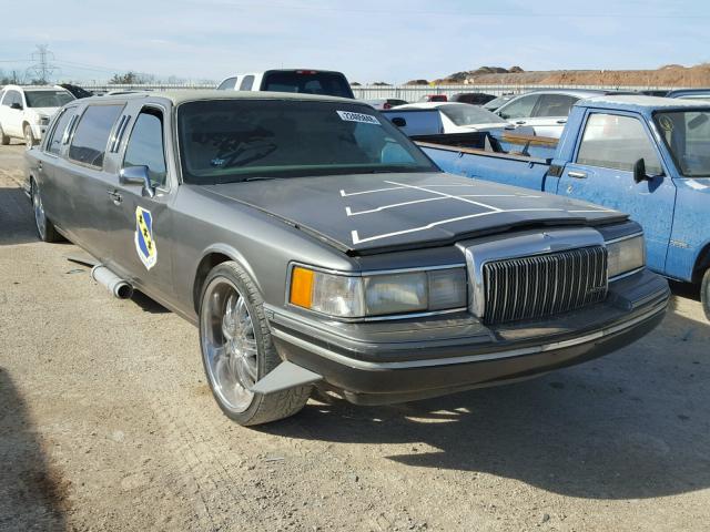 1LNLM81W4RY649670 - 1994 LINCOLN TOWN CAR E GRAY photo 1