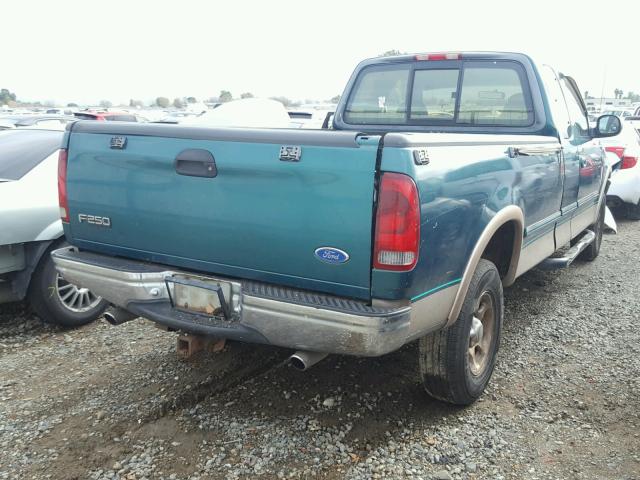 1FTDX18W2VKD24543 - 1997 FORD F150 GREEN photo 4