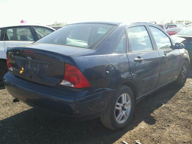 1FAFP33P12W334608 - 2002 FORD FOCUS LX BLUE photo 4