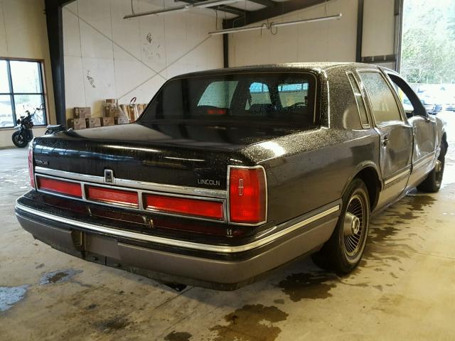 1LNLM82W9VY718894 - 1997 LINCOLN TOWN CAR S BLACK photo 4