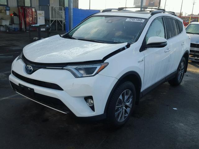 JTMRJREV7HD092855 - 2017 TOYOTA RAV4 HV LE WHITE photo 2