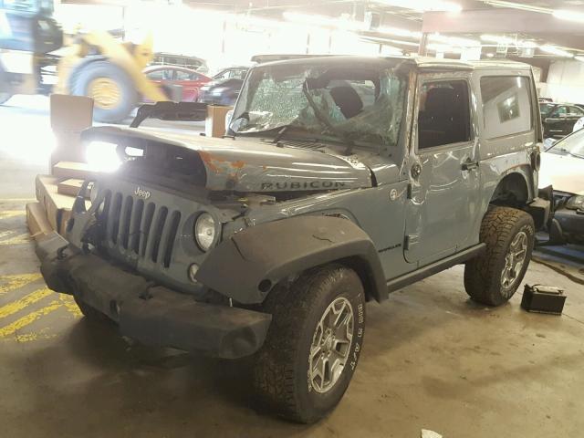 1C4BJWCG9EL122895 - 2014 JEEP WRANGLER R GRAY photo 2