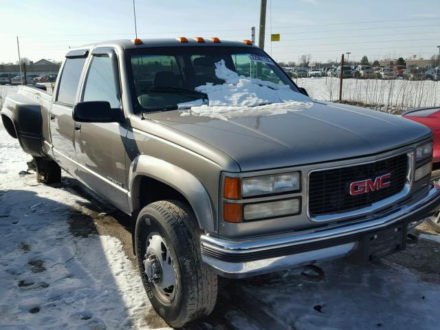 1GTHK33J7XF001172 - 1999 GMC SIERRA K35 TAN photo 1