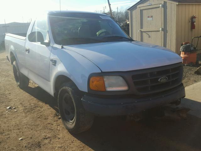 2FTRF17W04CA58193 - 2004 FORD F-150 HERI WHITE photo 1