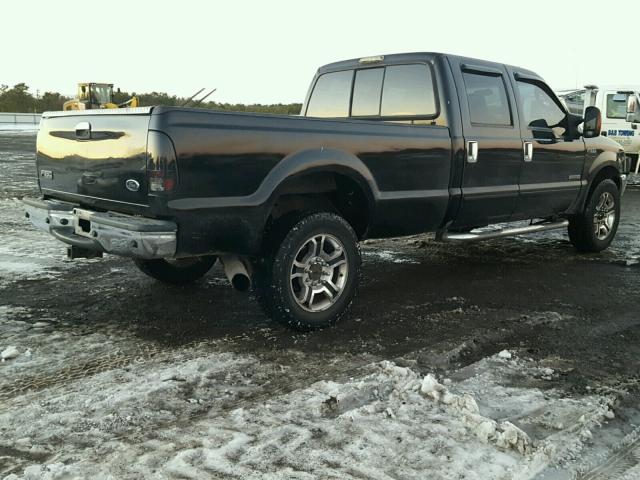 1FTSW31P94EC11176 - 2004 FORD F350 SRW S BLACK photo 4