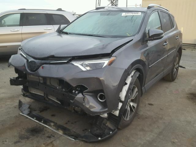 2T3WFREV4GW287401 - 2016 TOYOTA RAV4 XLE GRAY photo 2