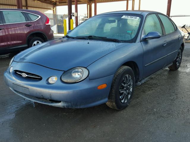 1FAFP53U4XA312236 - 1999 FORD TAURUS SE BLUE photo 2