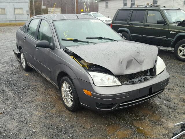 1FAFP34NX5W159812 - 2005 FORD FOCUS ZX4 GRAY photo 1