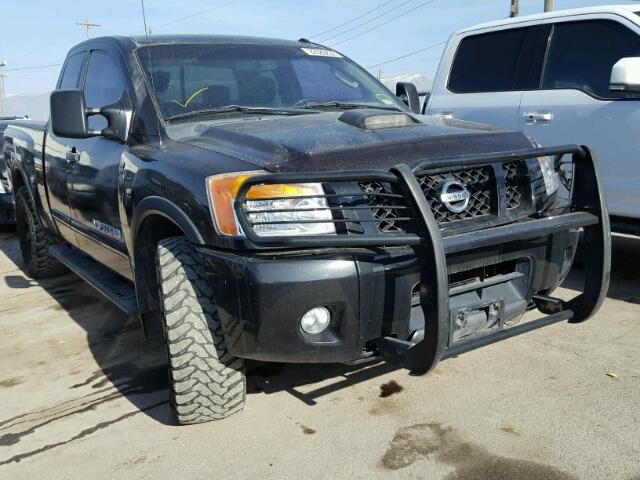 1N6BA0CC1AN323874 - 2010 NISSAN TITAN XE BLACK photo 1