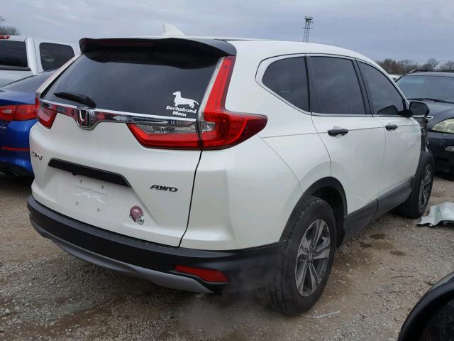 2HKRW6H31HH201217 - 2017 HONDA CR-V LX WHITE photo 4