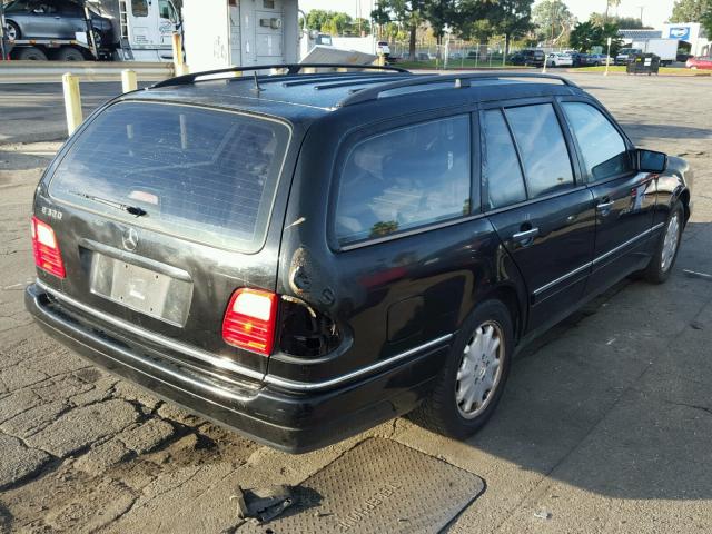 WDBJH65F8XA894023 - 1999 MERCEDES-BENZ E 320 BLACK photo 4