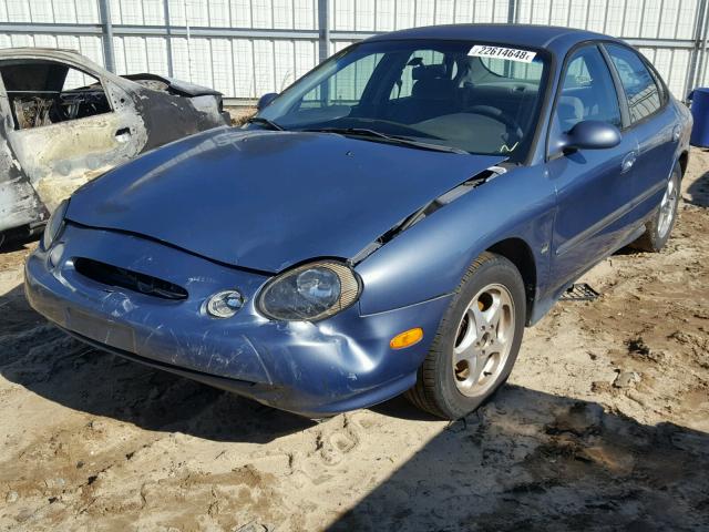 1FAFP53S3XA315577 - 1999 FORD TAURUS SE BLUE photo 2