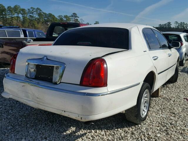 1LNHM82W4XY646317 - 1999 LINCOLN TOWN CAR S WHITE photo 4