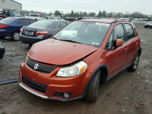 JS2YB417696202261 - 2009 SUZUKI SX4 TOURIN ORANGE photo 2