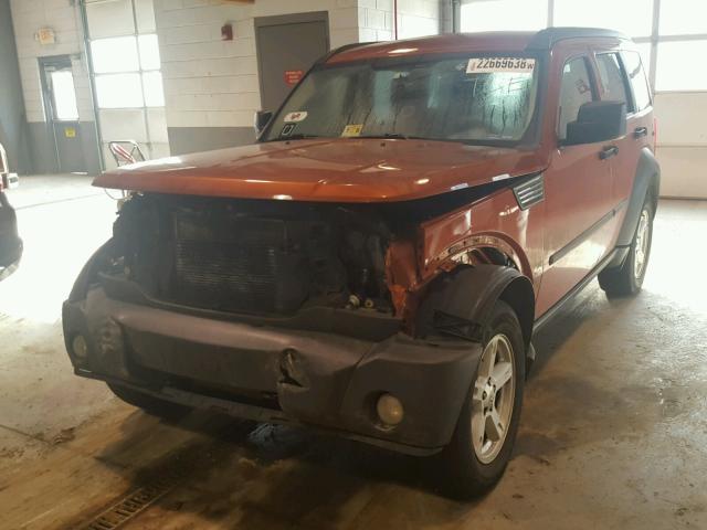 1D8GU28KX7W727756 - 2007 DODGE NITRO SXT ORANGE photo 2