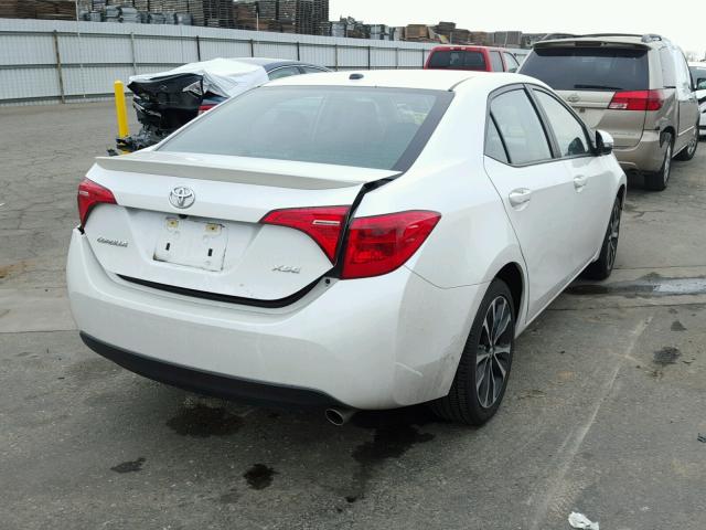 5YFBURHEXHP665359 - 2017 TOYOTA COROLLA L WHITE photo 4