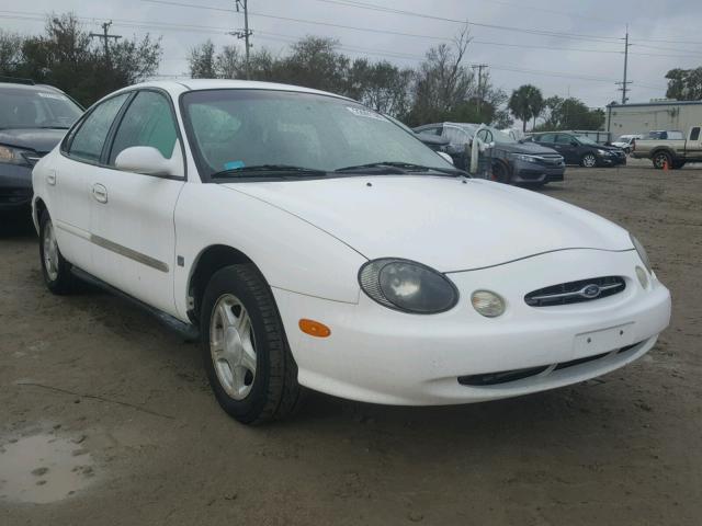 1FAFP53S9XA185725 - 1999 FORD TAURUS SE WHITE photo 1