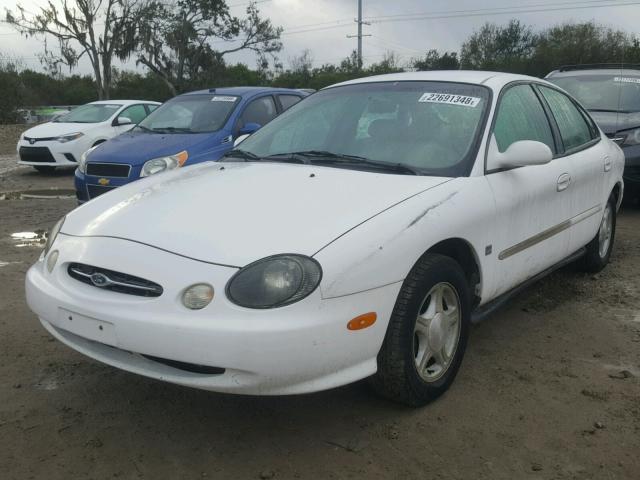 1FAFP53S9XA185725 - 1999 FORD TAURUS SE WHITE photo 2