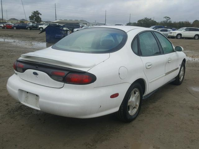 1FAFP53S9XA185725 - 1999 FORD TAURUS SE WHITE photo 4