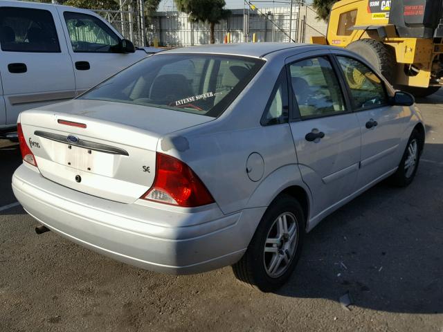 1FAFP34Z13W254503 - 2003 FORD FOCUS SE C GRAY photo 4