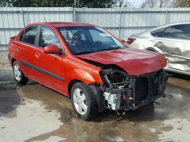 KNADE223596556771 - 2009 KIA RIO BASE ORANGE photo 1