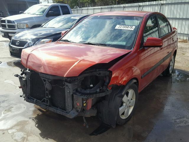 KNADE223596556771 - 2009 KIA RIO BASE ORANGE photo 2