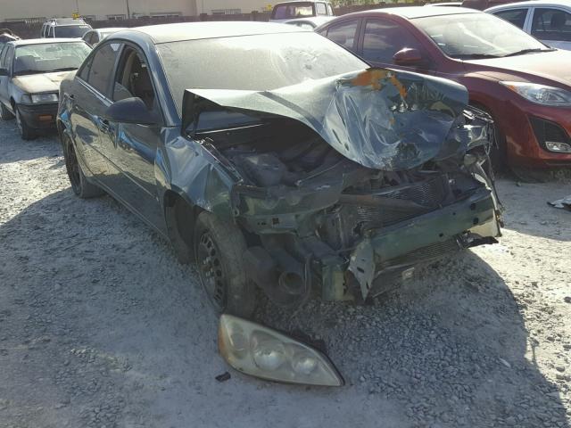 1G2ZG58B774267424 - 2007 PONTIAC G6 BASE GREEN photo 1