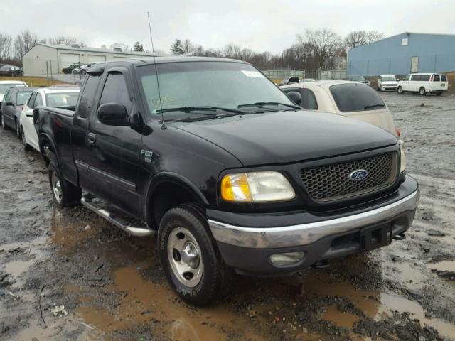 1FTRX18W32NB42916 - 2002 FORD F150 BLACK photo 1