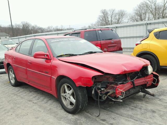 1G2NW52E5XM829437 - 1999 PONTIAC GRAND AM G RED photo 1