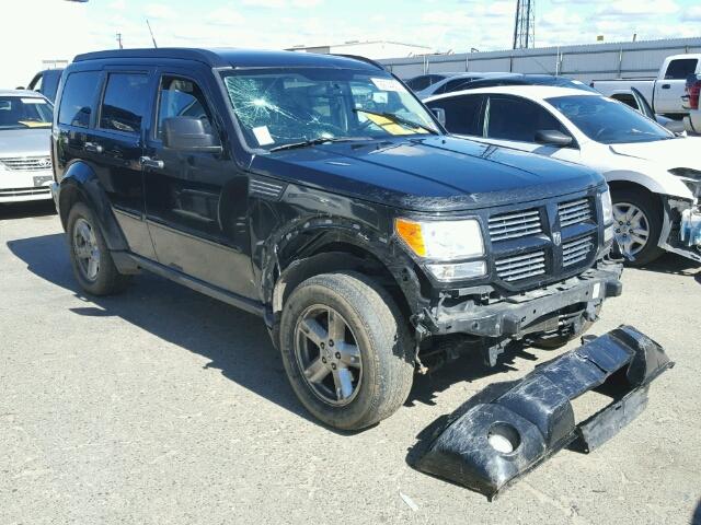 1D4PU5GK1BW568199 - 2011 DODGE NITRO SXT BLACK photo 1