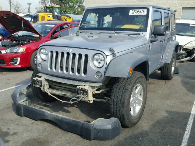 1C4HJWDG4EL177585 - 2014 JEEP WRANGLER U SILVER photo 2