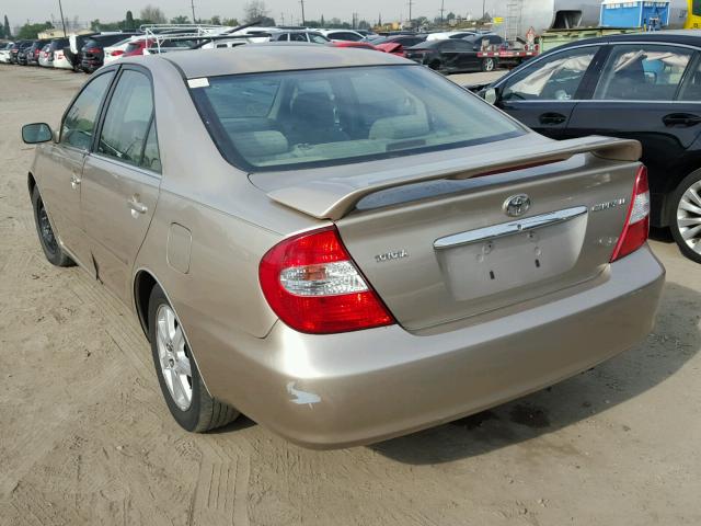 JTDBE32K120052394 - 2002 TOYOTA CAMRY LE GOLD photo 3