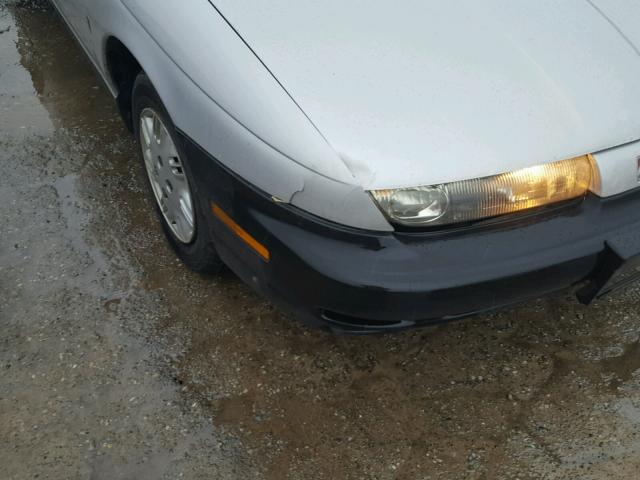 1G8ZH528XXZ350302 - 1999 SATURN SL1 SILVER photo 9