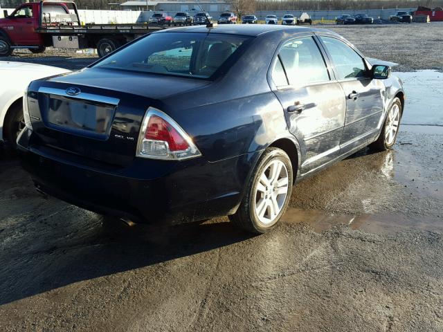 3FAHP08129R210422 - 2009 FORD FUSION SEL BLUE photo 4