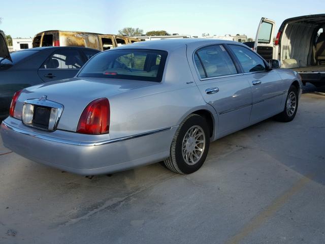 1LNHM82W61Y740013 - 2001 LINCOLN TOWN CAR S SILVER photo 4