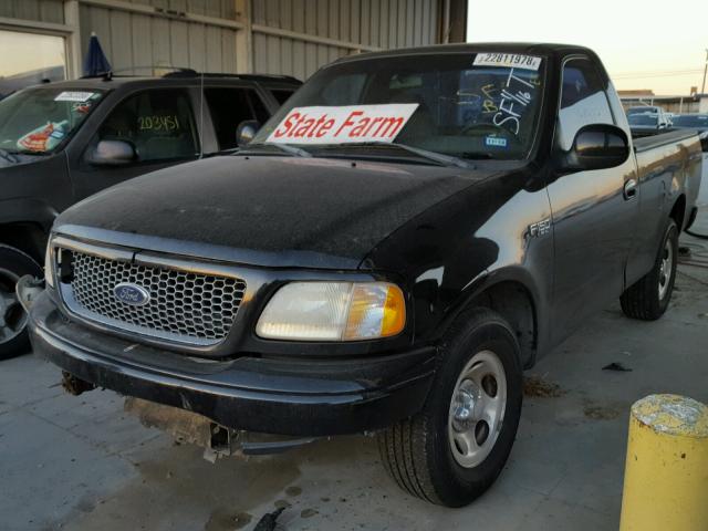 1FTZF17291NB57985 - 2001 FORD F150 BLACK photo 2