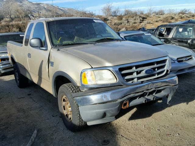 1FTPX18L3YNB64372 - 2000 FORD F150 GOLD photo 1