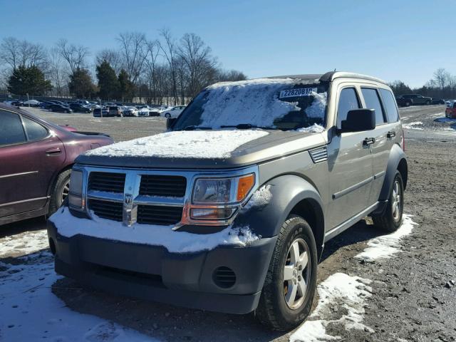 1D8GU28K77W629056 - 2007 DODGE NITRO SXT BEIGE photo 2