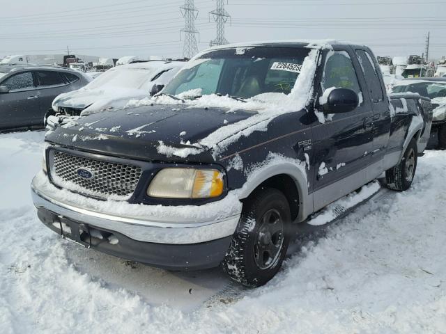 1FTRX17L5XNA64377 - 1999 FORD F150 BLUE photo 2