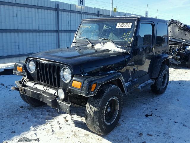 1J4FA59S52P711819 - 2002 JEEP WRANGLER / BLACK photo 2